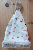 White Hearts stocking cap with faux fur trim