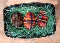Set of three painted wooden Easter Eggs